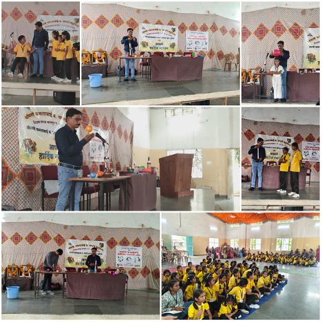 Students presenting science models at National Science Day exhibition